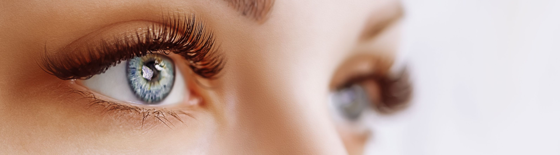 close up of woman with blue eyes