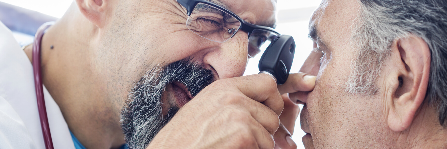 Elderly man examined by an ophthalmologist