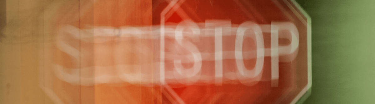 Stop sign through the point of view of someone with double vision