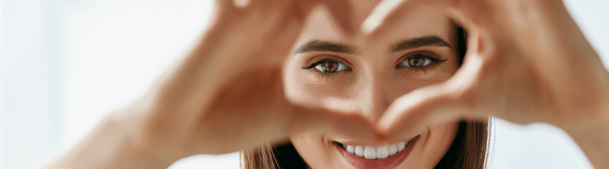 A woman practicing eye health.